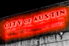 Neon Sign that says: City Of Austin